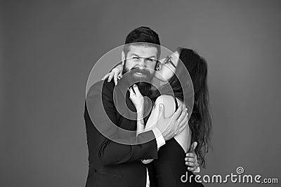 Love at first bite. Couple in love enjoy flirtation. Flirtation between sexy girl and bearded man. Flirtation and Stock Photo