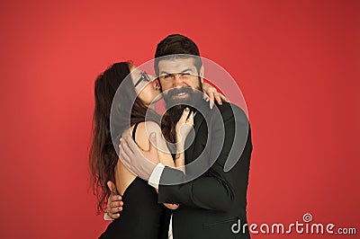 Love at first bite. Couple in love enjoy flirtation. Flirtation between sexy girl and bearded man. Flirtation and Stock Photo