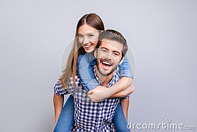 Love forever. Young brunete handsome bearded boyfriend is piggy Stock Photo