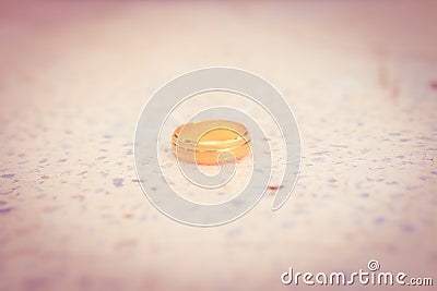 Love gold ring put on ground vintage style Stock Photo