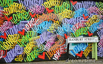 Love graffiti in Hanbury Street , Brick Lane, East London Editorial Stock Photo