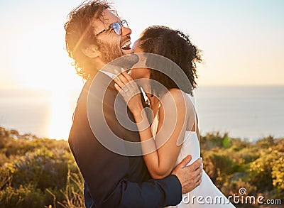 Love, happy and wedding with couple in nature for celebration, happiness and romance. Sunset, hug and affectionate with Stock Photo