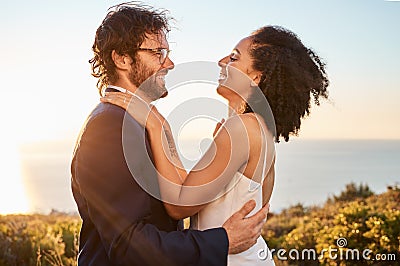 Love, happy and wedding with couple in nature for celebration, happiness and romance. Sunset, hug and affectionate with Stock Photo