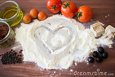 Love heart drawn in flour Stock Photo