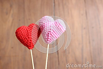 Love hearts on brown wood texture background, light soft tone, Stock Photo