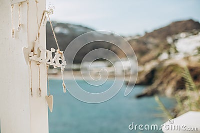Love inscription pier sea mountains resort travel Stock Photo