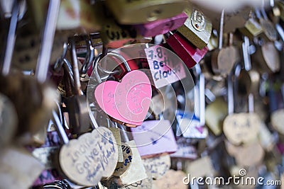 Love lock on a bridge in Paris Editorial Stock Photo