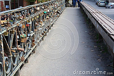 Love locks bridge in Uzupio, artistic suburb in Vilnius, Lithuania Editorial Stock Photo