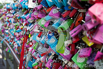 Love locks on a fence, close-up in Seoul, South Korea. Editorial Stock Photo