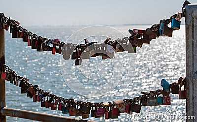 Love locks at the harbor entrance from BÃ¼sumer harbor Editorial Stock Photo