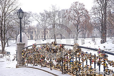 Love locks on a park bridge fence Stock Photo