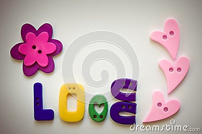 Love, made from plastic buttons Stock Photo