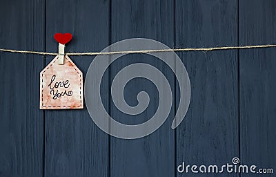Love Message on Valentine`s Day with the words `Love you` and Pink heart. Handmade. Flat Lay. Watercolor. Stock Photo