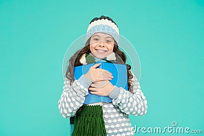 Love it so much. kid enjoying her book. winter story reading. christmas eve. little book lover. cosy and comfort. my Stock Photo