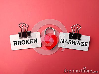 Love padlock with the word BROKEN MARRIAGE Stock Photo