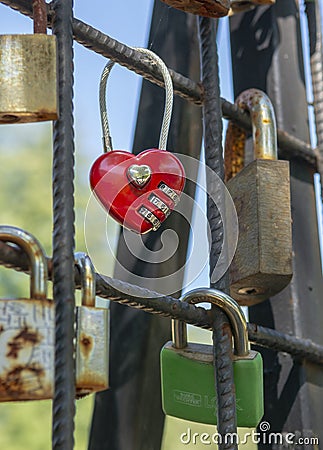 Love padlocks representing ever lasting love. Red heart love lock Stock Photo
