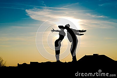 Love pair, silhouette, emotions, sunset Stock Photo