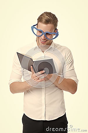 In love with poetry. University student with book. Romantic author. Teacher funny guy. Male student reading. Book nerd Stock Photo