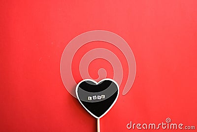 Love on red background Stock Photo