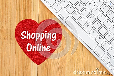 Love shopping online with a red glitter heart with a keyboard Stock Photo