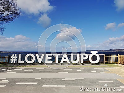 Love Taupo sign on the waterfront of the lake Taupo on the North Island of New Zealand Editorial Stock Photo