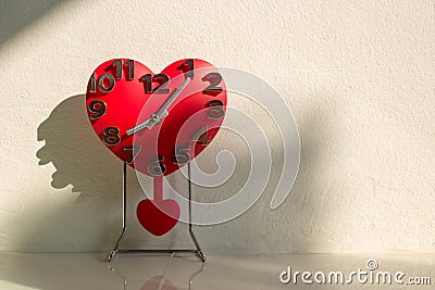 Love and time, heart shaped of clock decor at home Stock Photo