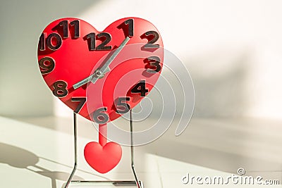 Love and time, heart shaped of clock decor at home Stock Photo