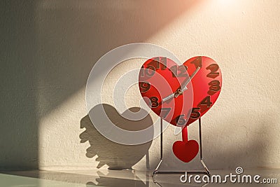 Love and time, heart shaped of clock decor at home Stock Photo