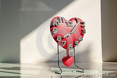 Love and time, heart shaped of clock decor at home Stock Photo