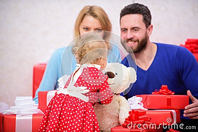 Love and trust in family. Bearded man and woman with little girl. Shopping online. father, mother and doughter child Stock Photo