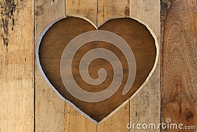 Love Valentines heart wooden frame brown background Stock Photo