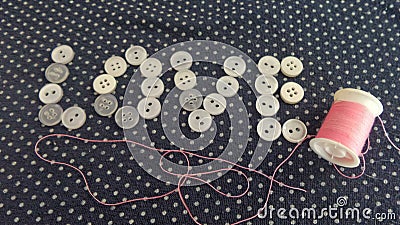 Love word craft ideas with buttons and thread reel creative home decoration Stock Photo
