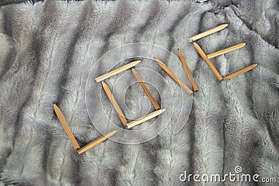 LOVE word made of wooden pencils Stock Photo