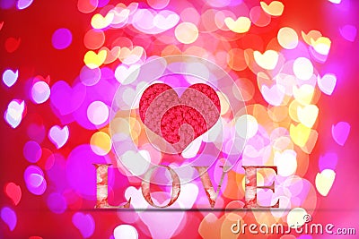 Love word wooden texture on blur bokeh background for valentine' Stock Photo