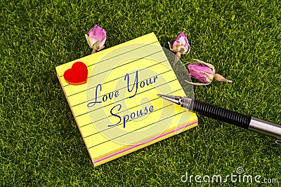 Love your spouse note Stock Photo