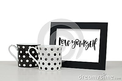 Love yourself. Handwritten text, inspirational quote. Modern cal Stock Photo