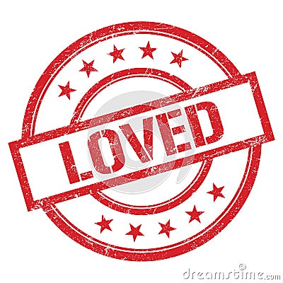 LOVED text written on red vintage stamp Stock Photo