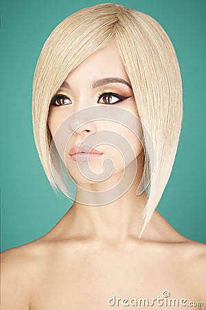 Lovely asian woman with blonde short hair Stock Photo