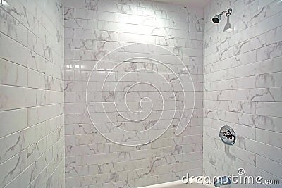 Lovely bathroom features a drop-in tub with shower Stock Photo