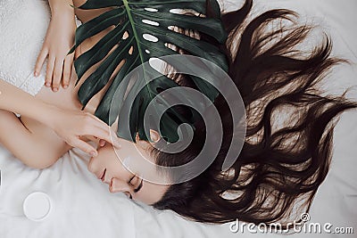 Lovely brunette with attractive appearance. Skin Care spa relax concept. Stock Photo