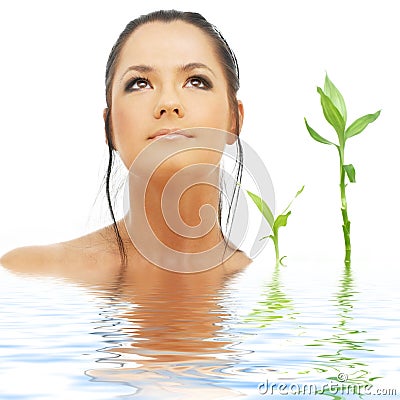 Lovely brunette with bamboo Stock Photo