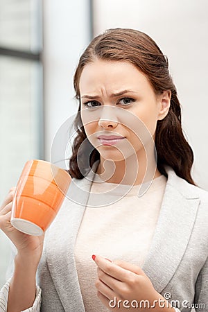 Lovely businesswoman with mug Stock Photo