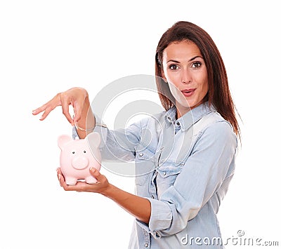 Lovely charming woman with her piggybank Stock Photo