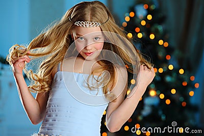 Lovely child in the background of a New Year tree Stock Photo