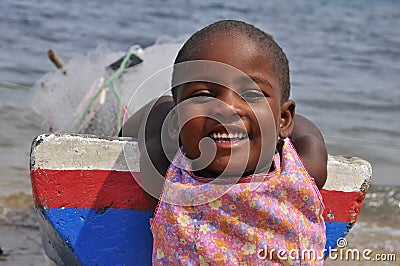 Lovely child with boat smiling Editorial Stock Photo