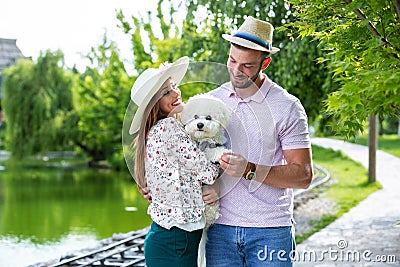 Lovely couple and their pet Stock Photo