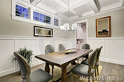 Lovely craftsman style dining room with coffered cealing Stock Photo