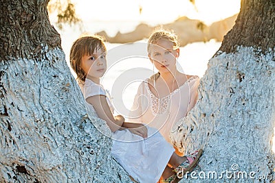 Lovely family. Cheerful girls outdoors portrait Stock Photo