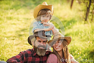 Lovely family nature background. Farmers relaxing. Reliable support for child. Family values. Good relations with family Stock Photo