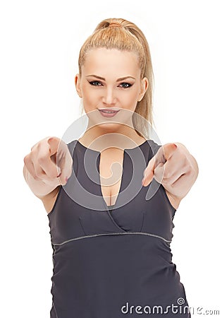 Lovely fitness instructor pointing her finger Stock Photo